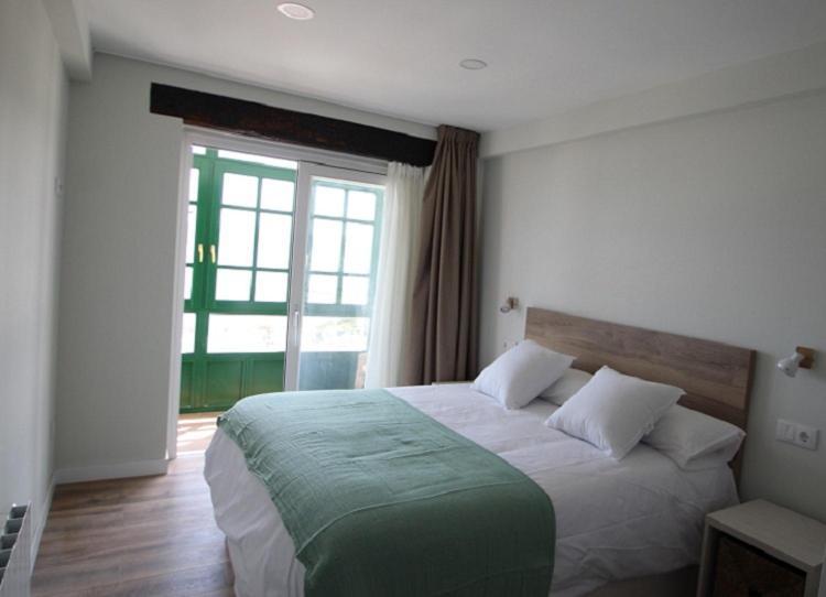 Apartamentos El Muelle Comillas Eksteriør bilde